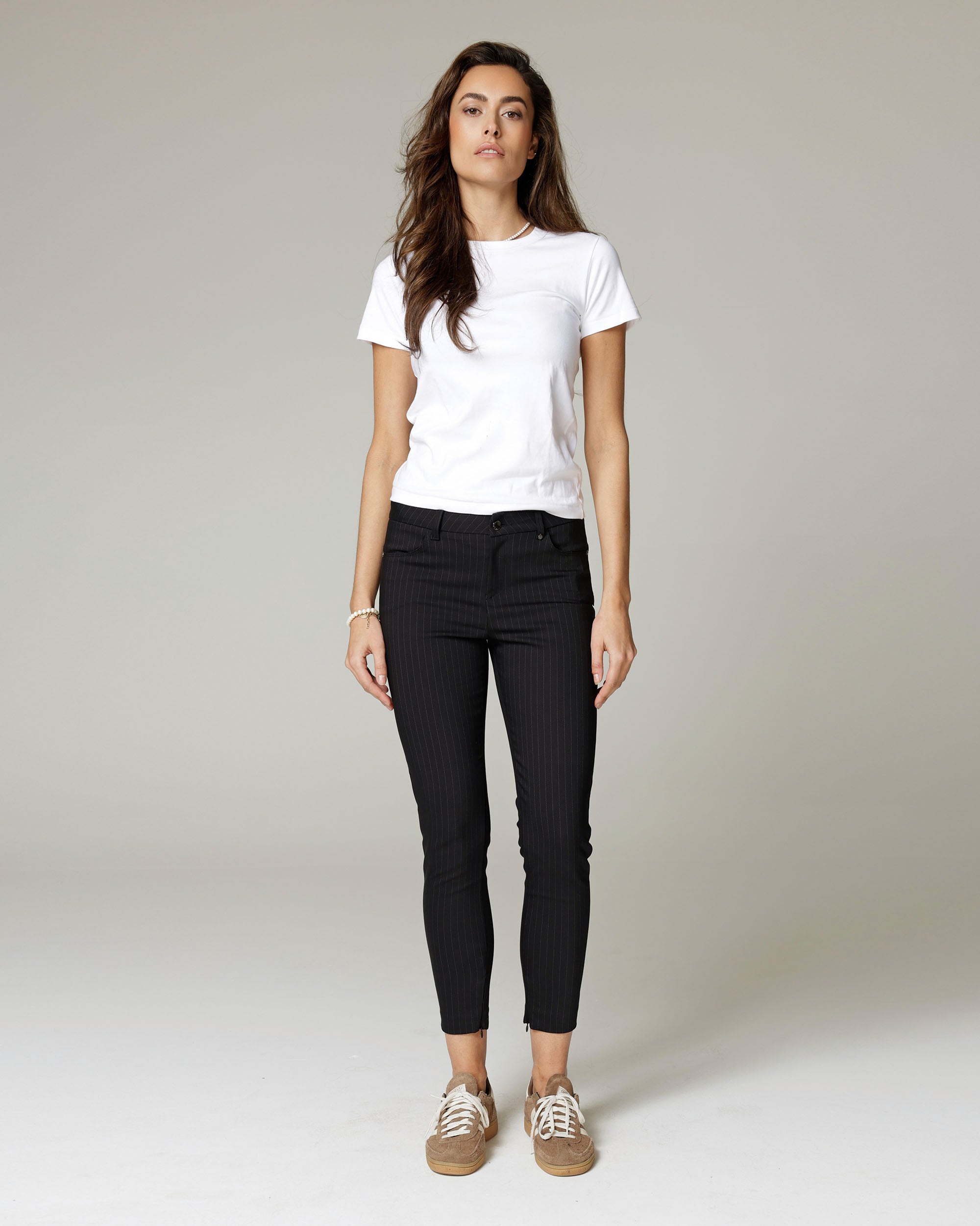 Black Pinstripe Skinny Trousers | The Amara Main image